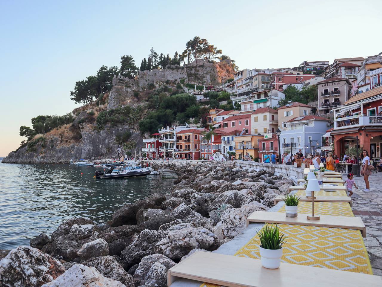 Colorful buildings above a harbor in Parga, Greece
